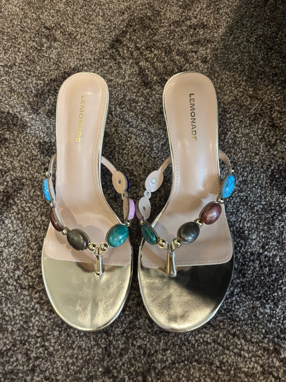 Lemonade Gold Metallic Beaded T-Strap Sandals in Gold with Multicolor Stones